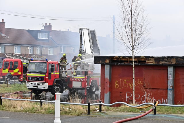 Fire crews attend the scene in Arum Street, Bradford, where a deserted youth club is on fire.