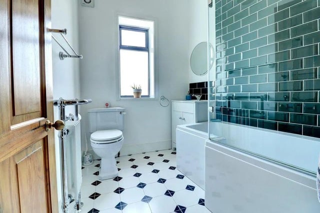 The stylish retro house bathroom is very in keeping with the property.