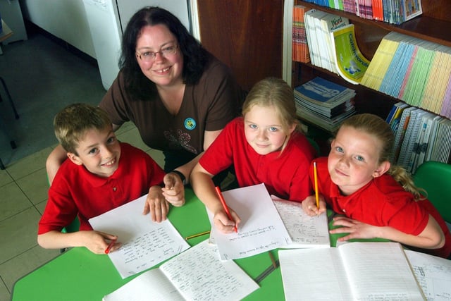 Emmerdale script writer Lisa Holdsworth visited Raynville Primary in July 2003. She is pictured with pupils, from left, Joe Hall, Emily Hill and Charlotte Sizer.