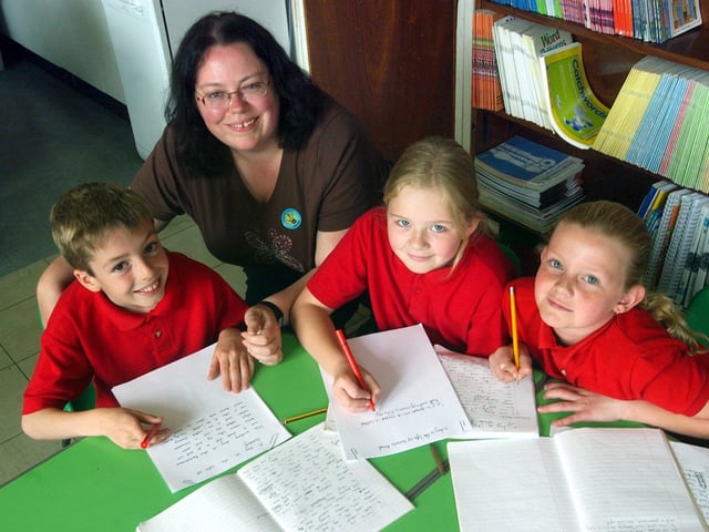 Emmerdale script writer Lisa Holdsworth visited Raynville Primary in July 2003. She is pictured with pupils, from left, Joe Hall, Emily Hill and Charlotte Sizer.