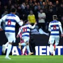 CAPITULATION: Leeds United at QPR, above, as Joel Piroe, right, heads back to the centre circle. Photo by Steven Paston/PA Wire.