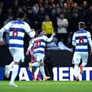 CAPITULATION: Leeds United at QPR, above, as Joel Piroe, right, heads back to the centre circle. Photo by Steven Paston/PA Wire.