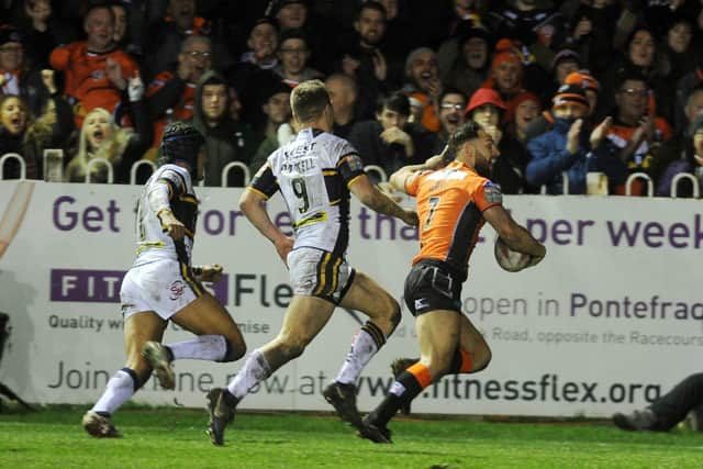 Luke Gale seen scoring for Castleford against Leeds in 2017, when he was named Man of Steel. Picture by Steve Riding.
