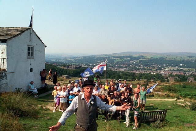 Derek Arnold of the White Wells Spa leads the singing of 'On Ilkley Moor Baht At at the White Wells Spa on Ilkley Moor, to celebrate Yorkshire Day in August 1999 and raise funds for the cancer ward at Airedale District Hospital.
