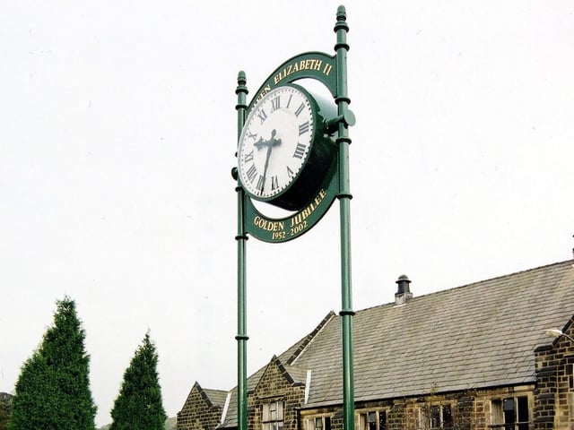 Horsforth's Golden Jubilee Clock on Hall Lane at the junction with Fink Hill in October 2003. The time piece was unveiled in July 2002 when the town's oldest resident, 103 year Ethel Nixon cut the ribbon.