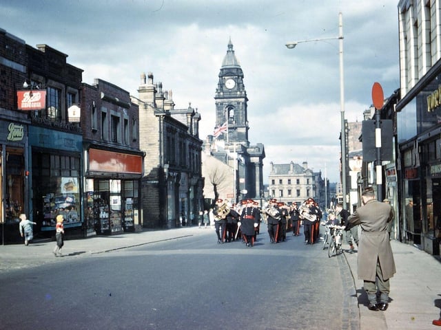 The procession along Queen Street as part of the celebrations which were reported by the. Morley Observer. The paper gave an account of the participants in the procession which was led by the 7th Leeds Rifle Band and included the Leeds Rifles Territorial Army (just glimpsed and wearing black berets). It was also reported that the band was accompanied by Morley "A Cs" - it is unclear of the meaning of this abbreviation but it perhaps stood for the Morley Salvation Army Citadel.