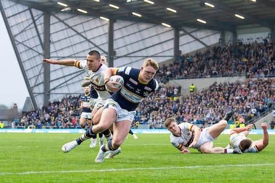 James McDonnell scored four tries during his first season with Leeds Rhinos, including this touchdown at home to Huddersfield Giants last April. Picture by Allan McKenzie/SWpix.com.