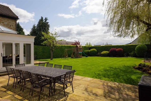 The garden is perfect for entertaining and benefits from great afternoon and evening sun, with a Yorkshire Stone terrace, lawns and mature shrubbery