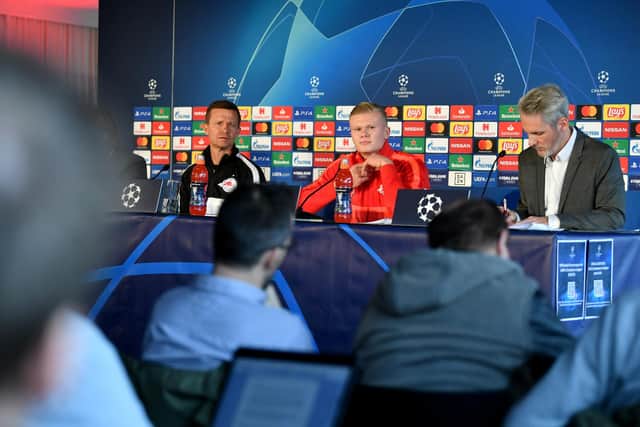 SPECIAL MEMORIES: Jesse Marsch, left, as head coach of RB Salzburg with a 19-year-old Erling Haaland, centre, as their team prepared to face Liverpool in the Champions League in December 2019. Photo by BARBARA GINDL/APA/AFP via Getty Images.