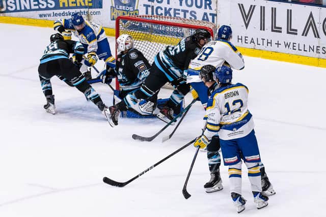 TWO'S COMPANY: Owen Sobchak (top left) jams home the puck to make it 2-0 to Leeds Knights against Solway on Friday. Picture: Charlotte Clark/Knights Media.