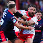 Hull KR's Jared Waerea-Hargreave is tackled by Matty Lees, of St Helens, during last weekend's Super League semi-final. Picture by Olly Hassell/SWpix.com.