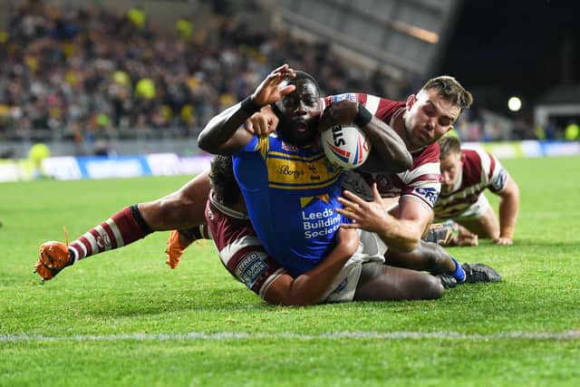 Muizz Mustapha scores Rhinos' seventh and final try in the shock win over Wigan. Picture by Jonathan Gawthorpe.