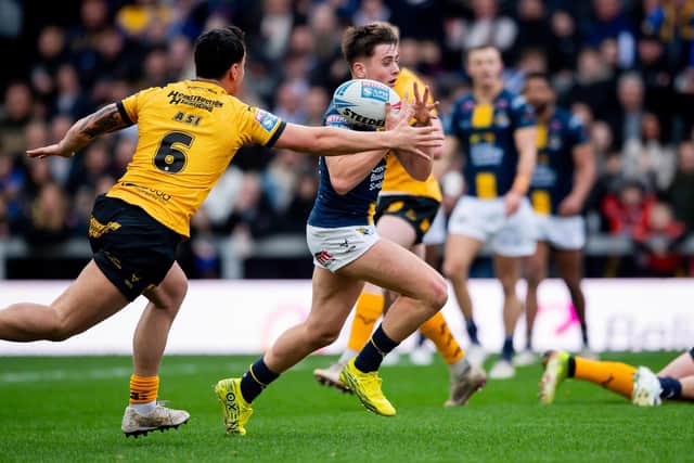 Leeds Rhinos fan Katie Marczynski would like to see George Brown, pictured going over to score against Castleford Tigers, get another opportunity in Friday's Betfred Challenge Cup tie at Wakefield Trinity. Picture by Allan McKenzie/SWpix.com.