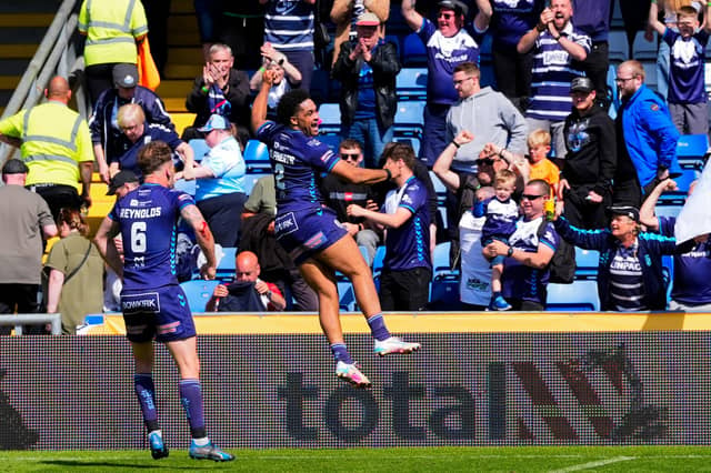 Derrell Olpherts, right, jumps for joy as the final whistle sounds in Featherstone Rovers' 1895 Cup semi-final win at Oldham last month. Picture by Olly Hassell/SWpix.com.
