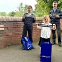 Street naming winners, Emily and Joel pictured with Miller Homes Yorkshire marketing manager, Chris