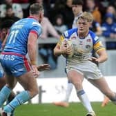 James McDonnell takes on Matty Ashurst during Leeds Rhinos' Boxing Day win over Wakefield Trinity. Picture by Steve Riding.