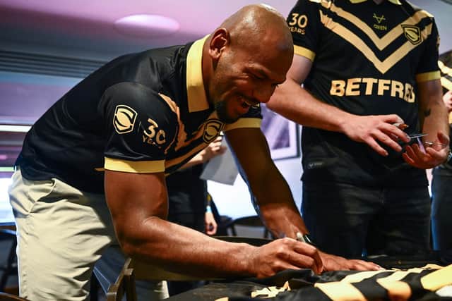 Leeds Rhinos' Maika Sivo signs a short during this week's play-offs launch/Dream Team presentation at Old Trafford. Picture by Olly Hassell/SWpix.com.