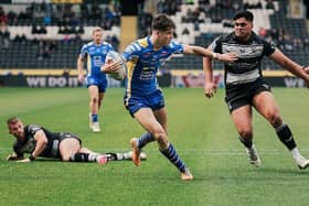 Riley Lumb scores his first senior try in his Leeds Rhinos debut at Hull FC. Picture by Alex Whitehead/SWpix.com.