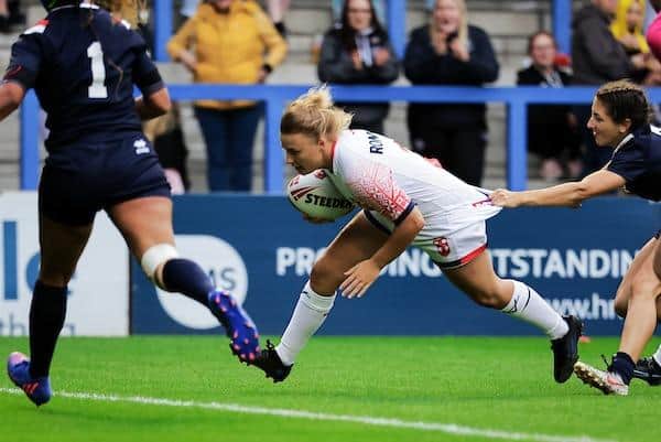 Rhinos' Georgia Roche scores for England in their mid-season win over France. Picture by Alex Whitehead/SWpix.com.