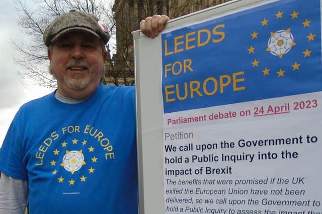 Contributor Peter Packham promoting Brexit impact petition at March 2023 Leeds city centre demo.