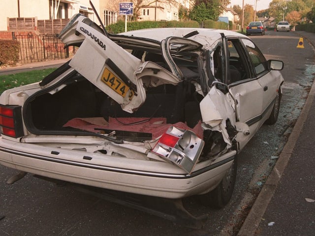 This was the damage to a car on Parkstone Grove in Cookridge caused by a council lorry. Pictured in October 1999.