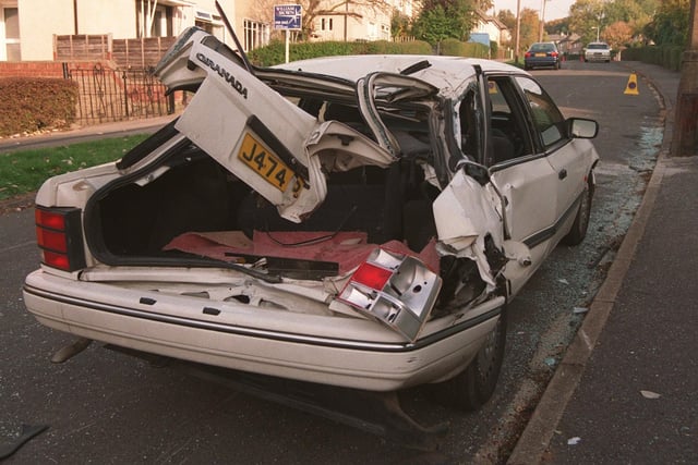 This was the damage to a car on Parkstone Grove in Cookridge caused by a council lorry. Pictured in October 1999.