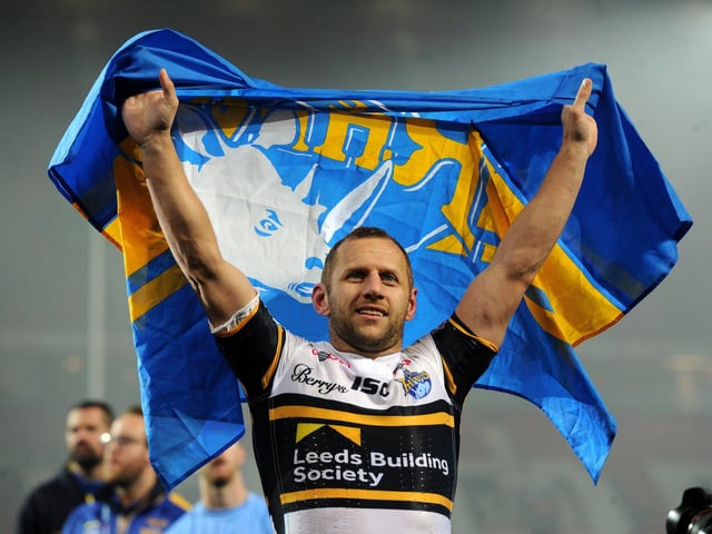 Rob Burrow celebrates becoming an eight-time Super League champion, in his final competitive game as a player.