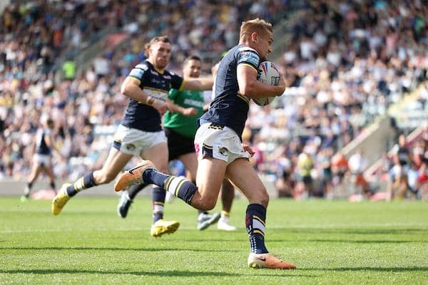 Luke Hooley scores for Rhinos during their Headingley win over Warrington in August. Picture by John Clifton/SWpix.com.