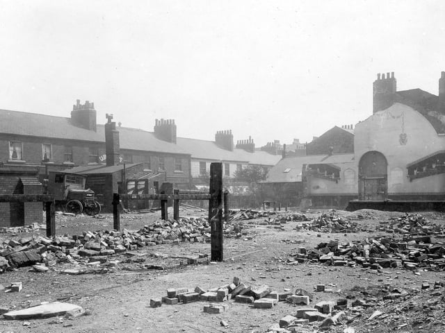 Shops along Merrion Street can be seen running from right to left in this photo from June 1929. The building to the right of the photo is the Victoria Club. 51c New Briggate, now Nash's Fish Restaurant.