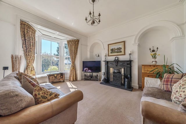 The spacious living room has a large walk-in bay window to front elevation with double glazed sash windows.