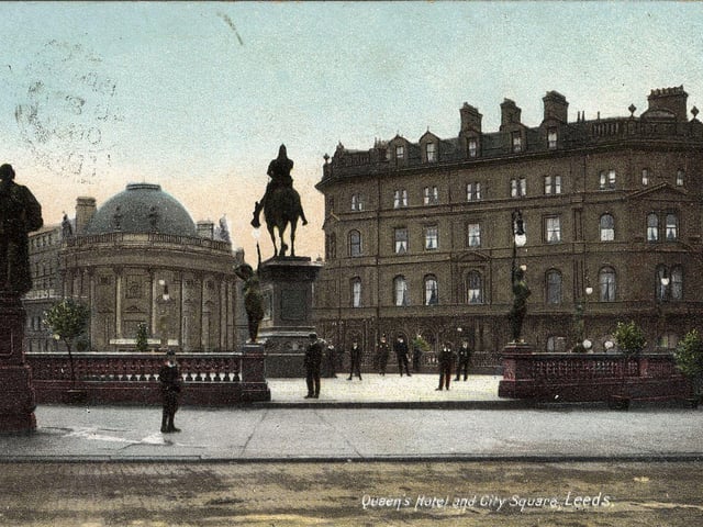 A colour-tinted postcard of City Square with a postmark August 8, 1906. The statues of John Harrison, left, and the Black Prince, centre, can be seen, along with two of Alfred Drury's 'Morn' and 'Even' figure lamps. In the background are the London City and Midland Bank, left, later just the Midland Bank, and the original Queens Hotel, right, dating back to 1863.