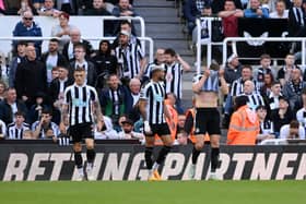 FRUSTRATION: For Newcastle United trio Kieran Trippier, left, Joelinton, centre, and Sven Botman, right, after Arsenal doubled their lead in Saturday's Premier League clash at St James' Park via a Fabian Schar own goal en route to a 2-0 victory for the Gunners. Photo by Stu Forster/Getty Images.