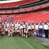Batley Bulldogs players and staff at Wembley on Friday. Picture by Peter Smith.