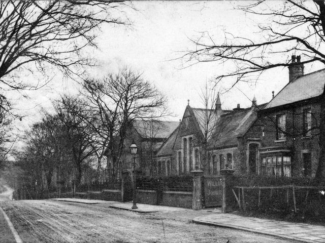 Postcard with a postmark of April 16, 1904 showing the south-east side of Shadwell Lane. In the centre is Moortown Council School, now known as Moortown Primary School.