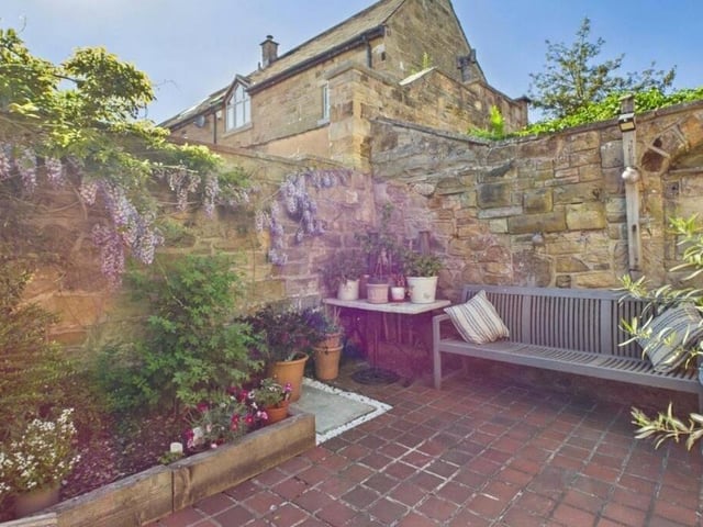 The courtyard garden with seating.
