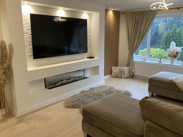 A relaxed and modern setting, with large windows admitting plenty of natural light.