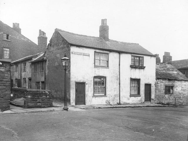 View of cottages and property which comprised Woodhouse Cliff. They faced onto an area of open land which was off Woodhouse Street, adjacent to Hyde Park Corner. Pictured in June 1913.