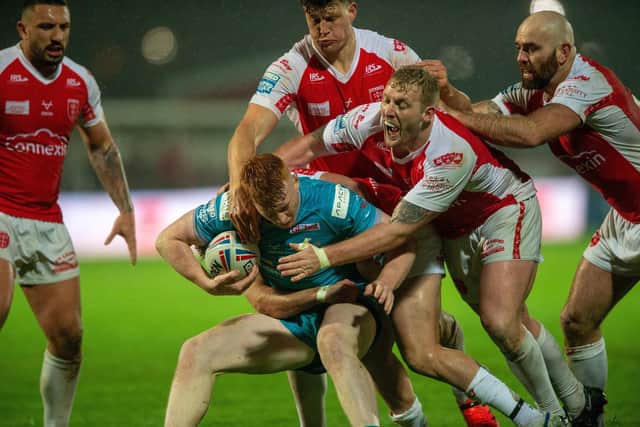 Luis Roberts is tackled. Picture by Bruce Rollinson.