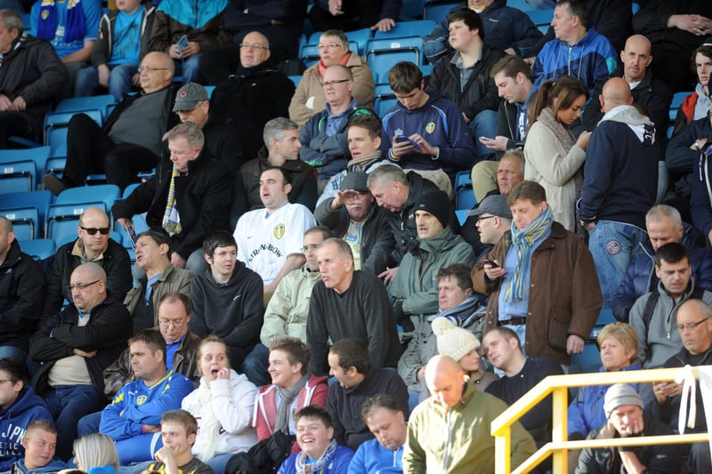 Leeds United fans in the winter sun in November 2012 at Millwall's ground, The Den. Pic: Mark Bickerdike