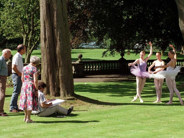 Three ballerinas pose for an artist captures the moment during a art workshop held in the grounds of Sewerby Hall  in July 1998.