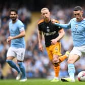 RUNAROUND: Given to Leeds United and Adam Forshaw, left, by Manchester City with the likes of Phil Foden, right, in Saturday's 2-1 defeat at the Etihad.
Photo by Gareth Copley/Getty Images.