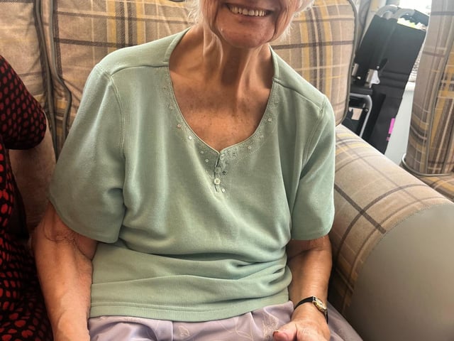 Resident from HC-One’s April Park Care Home with tortoise from Leanimals Petting Zoo