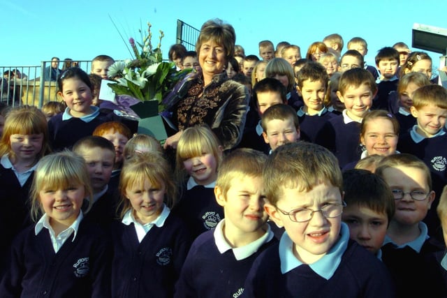 Former headteacher Frances Lambley opened the new Rufford Park Primary School at Yeadon in January 2006. She is pictured with some of the pupils after the opening ceremony.