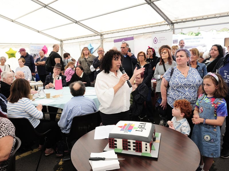 The cutting of the birthday cake as LJHA chairwoman Jayne Mynick thanks guests for attending