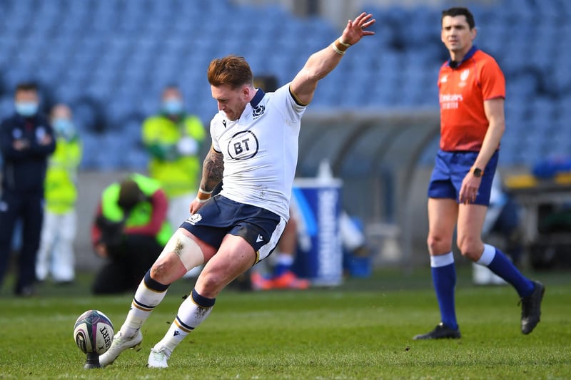 Stuart Hogg kicks a conversion during the Six Nations international rugby union match between Scotland and Italy at Murrayfield Stadium in Edinburgh on March 20, 2021 (Photo by Andy Buchanan/AFP via Getty Images)