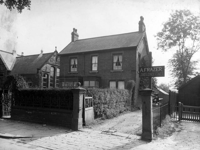 Shadwell Lane showing, in the centre, no. 4, Alan Frazer, joiner and undertaker. To the left part of Moortown Council School (now Moortown Primary School) can be seen. Pictured in August 1939.