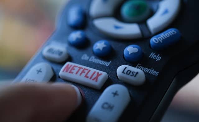Netflix is launching the sub-account model soon, and a cheaper subscription package next month. Picture: Chris DELMAS/AFP via Getty Images.