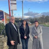 Councillors Lewis, Midgely and Harland at one of the bus stops affected by the reduced services.