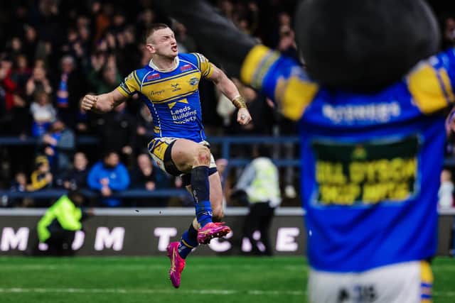 Harry Newman celebrates Leeds Rhinos' win over Wigan Warriors. Picture by Alex Whitehead/SWpix.com.