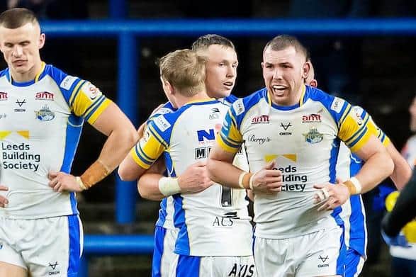 Harry Newman is congratulated after scoring for Leeds Rhinos against St Helens. Picture by Allan McKenzie/SWpix.com.